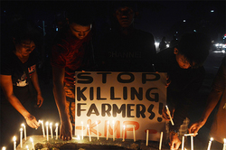 Medium_mindanao_farmers_candle_vigil