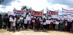 Medium_cropsrc-lac-land-grab-protest