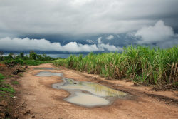 Medium_sl-water-on-road-awa2013007m0526-5796-e1541617202663