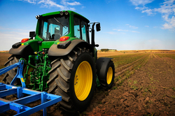 Medium_bigstock-the-tractor-modern-farm-equi-4469239