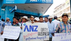 Medium_people_from_kampong_speu_protest_in_front_of_an_anz_bank_branch_in_phnom_penh_in_late_2014_pha_lina